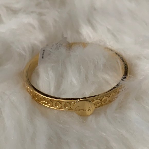 COACH Thin Optic Art Hinged Bangle in Gold - Picture 1 of 2